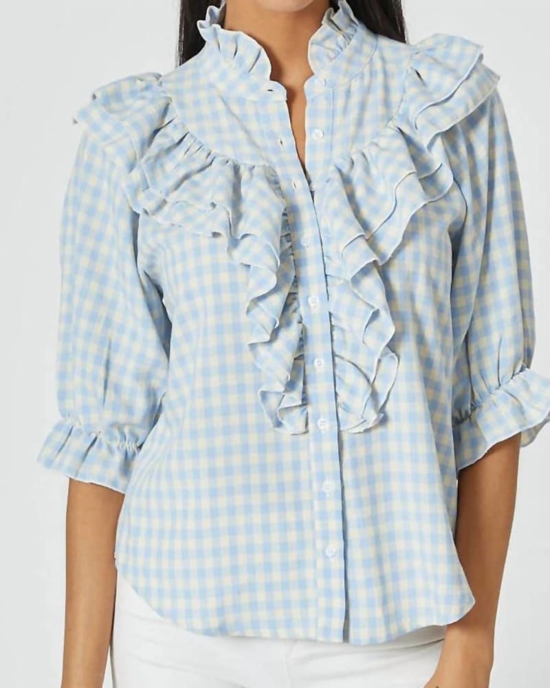 Front of a model wearing a size X-Large The Jill Ruffle Top in Light Blue in Light Blue by THE SHIRT. | dia_product_style_image_id:340448